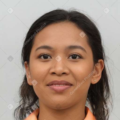 Joyful asian young-adult female with long  brown hair and brown eyes