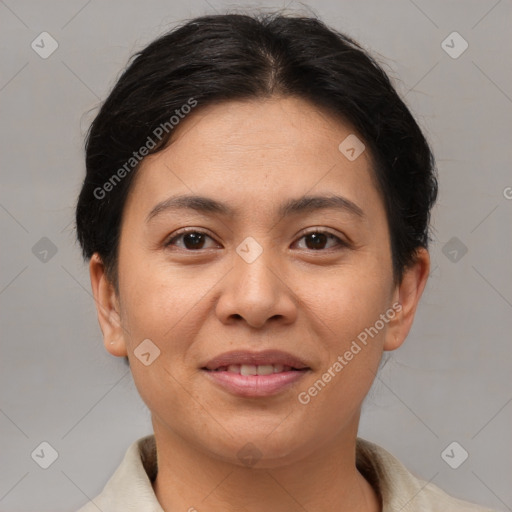 Joyful asian young-adult female with short  brown hair and brown eyes