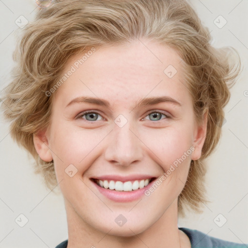 Joyful white young-adult female with medium  brown hair and blue eyes