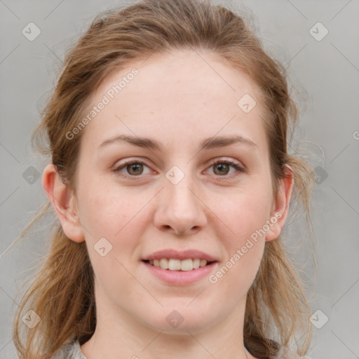 Joyful white young-adult female with medium  brown hair and blue eyes