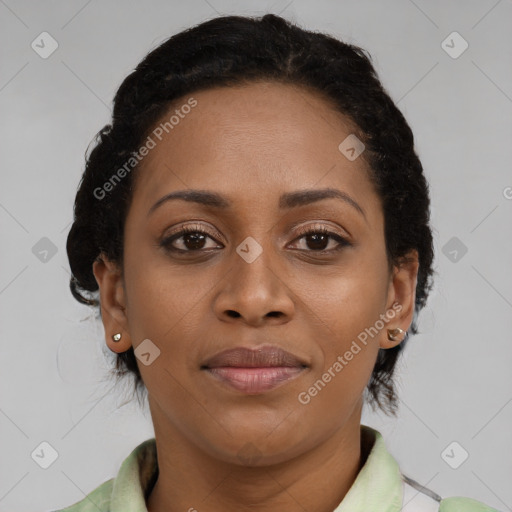 Joyful black young-adult female with medium  brown hair and brown eyes