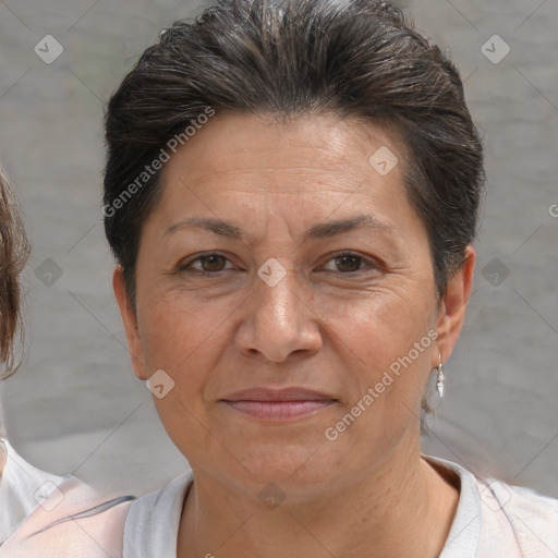 Joyful white adult female with short  brown hair and brown eyes