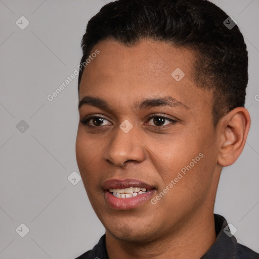 Joyful white young-adult male with short  black hair and brown eyes