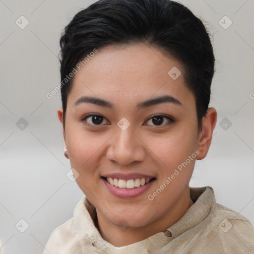 Joyful latino young-adult female with short  brown hair and brown eyes