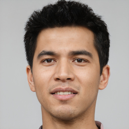 Joyful asian young-adult male with short  black hair and brown eyes