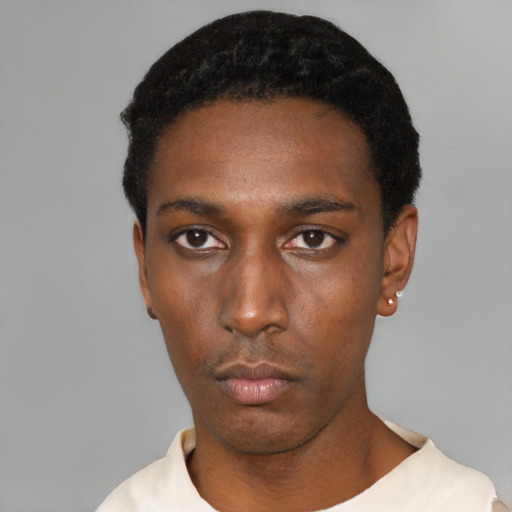 Neutral black young-adult male with short  black hair and brown eyes