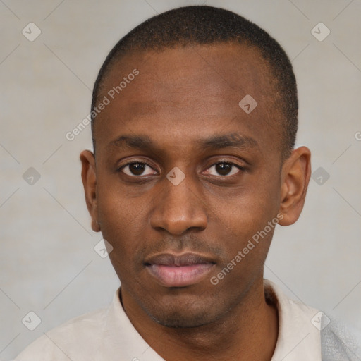 Neutral black young-adult male with short  brown hair and brown eyes