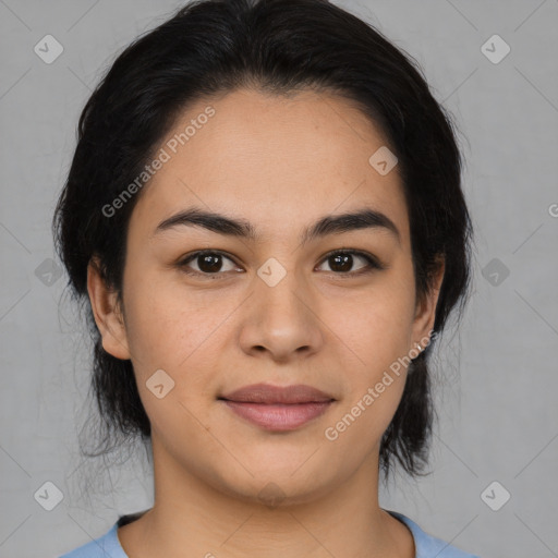 Joyful latino young-adult female with medium  black hair and brown eyes