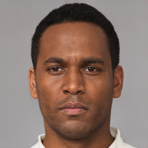 Neutral black young-adult male with short  brown hair and brown eyes
