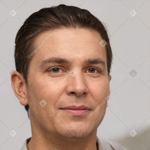 Joyful white adult male with short  brown hair and brown eyes