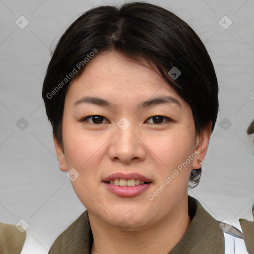 Joyful asian young-adult female with short  brown hair and brown eyes