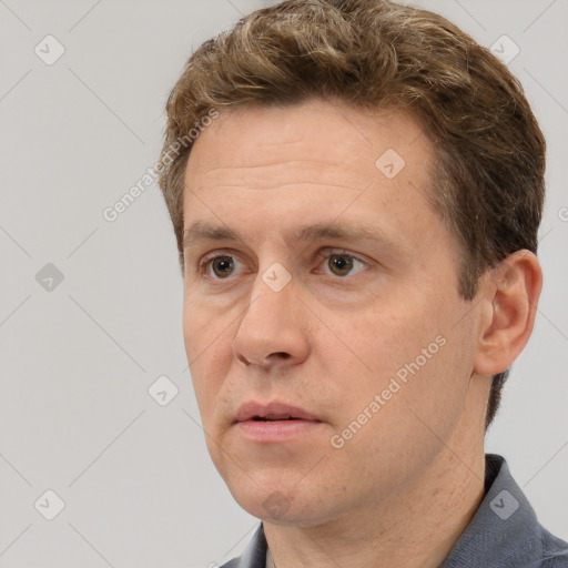 Neutral white adult male with short  brown hair and brown eyes