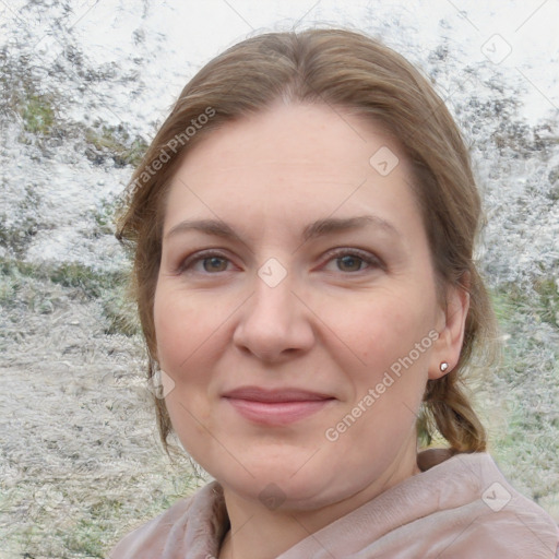 Joyful white adult female with medium  brown hair and grey eyes