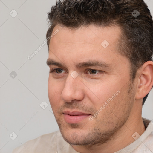 Neutral white young-adult male with short  brown hair and brown eyes