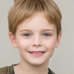 Joyful white child male with short  brown hair and grey eyes