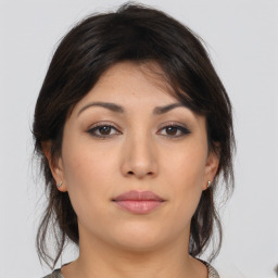 Neutral asian young-adult female with medium  brown hair and brown eyes