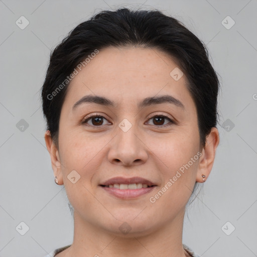 Joyful white young-adult female with medium  brown hair and brown eyes