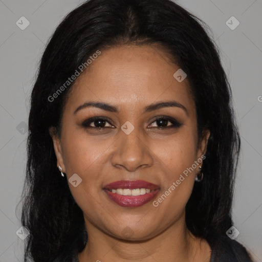 Joyful latino young-adult female with long  brown hair and brown eyes