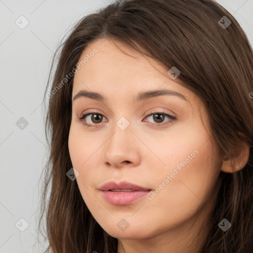 Neutral white young-adult female with long  brown hair and brown eyes