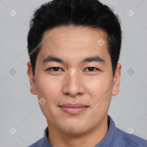 Joyful asian young-adult male with short  brown hair and brown eyes