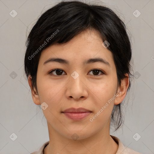 Joyful asian young-adult female with medium  black hair and brown eyes