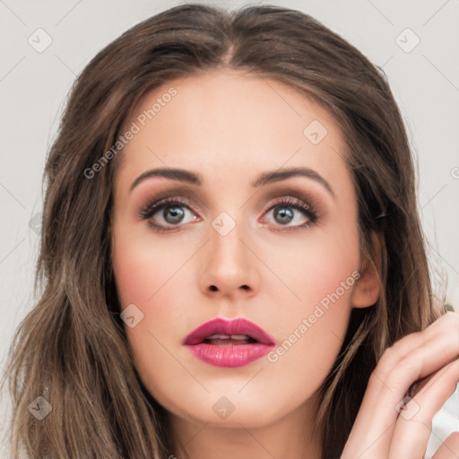 Neutral white young-adult female with long  brown hair and brown eyes