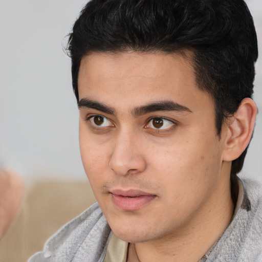Neutral asian young-adult male with short  black hair and brown eyes