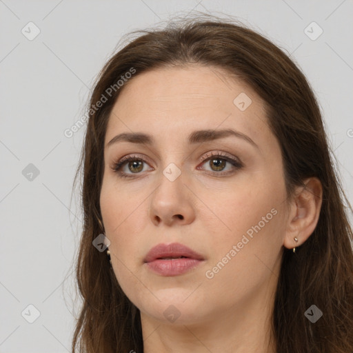 Neutral white young-adult female with long  brown hair and brown eyes