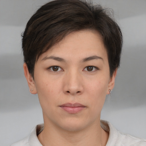 Neutral white young-adult female with short  brown hair and brown eyes