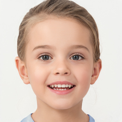 Joyful white child female with short  brown hair and brown eyes