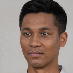 Neutral black young-adult male with short  black hair and brown eyes