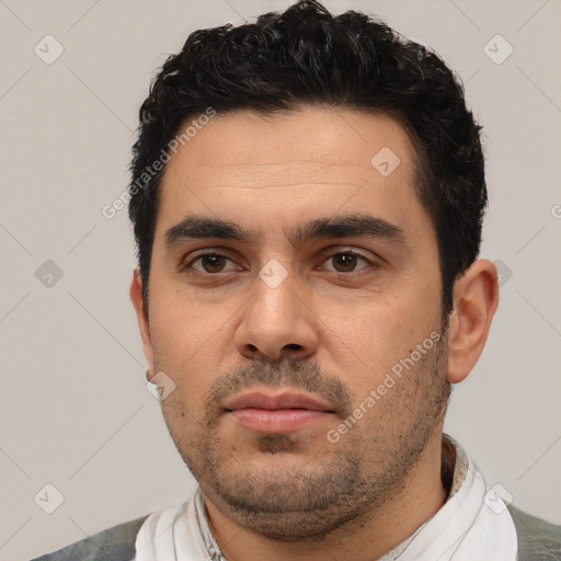 Neutral white young-adult male with short  black hair and brown eyes