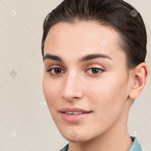 Joyful white young-adult female with short  brown hair and brown eyes