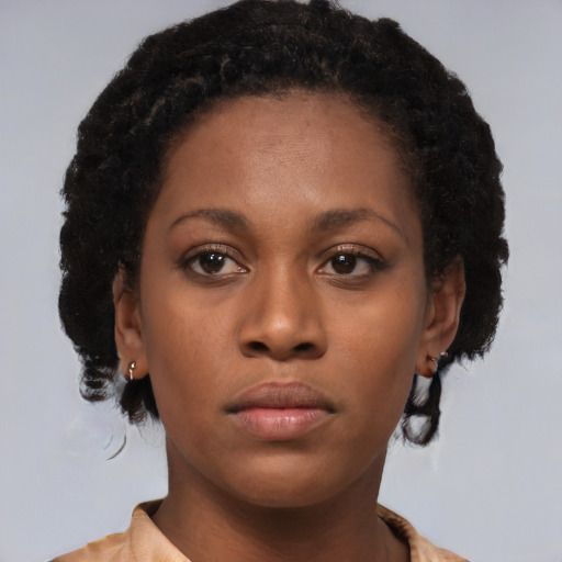 Neutral black young-adult female with short  brown hair and brown eyes