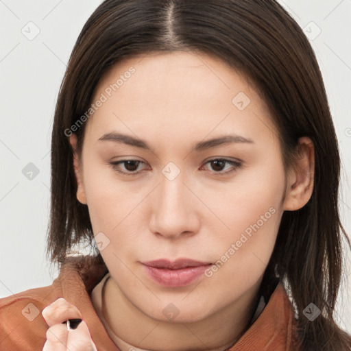 Neutral white young-adult female with long  brown hair and brown eyes