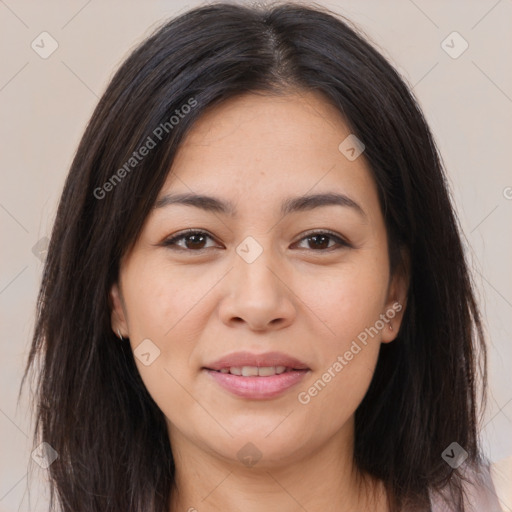 Joyful asian young-adult female with long  brown hair and brown eyes