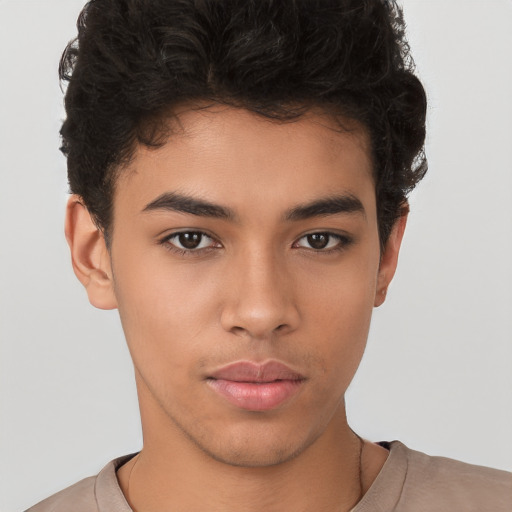 Neutral latino young-adult male with short  brown hair and brown eyes