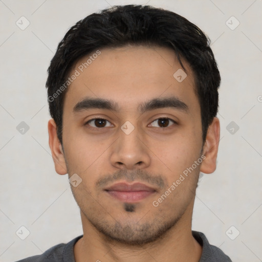 Neutral latino young-adult male with short  black hair and brown eyes