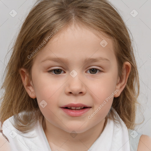 Joyful white child female with medium  brown hair and brown eyes