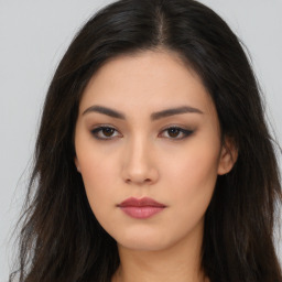 Neutral asian young-adult female with long  brown hair and brown eyes