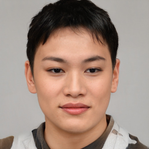 Joyful asian young-adult female with short  brown hair and brown eyes