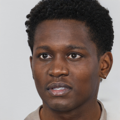 Neutral black young-adult male with short  brown hair and brown eyes