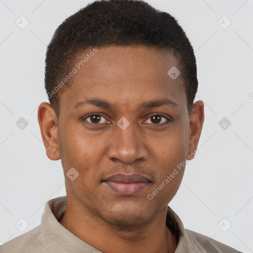 Joyful black young-adult male with short  brown hair and brown eyes