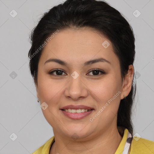 Joyful latino young-adult female with medium  brown hair and brown eyes