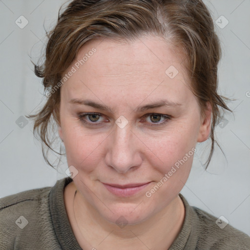 Joyful white young-adult female with medium  brown hair and blue eyes