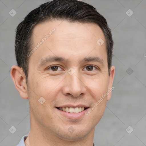 Joyful white adult male with short  brown hair and brown eyes