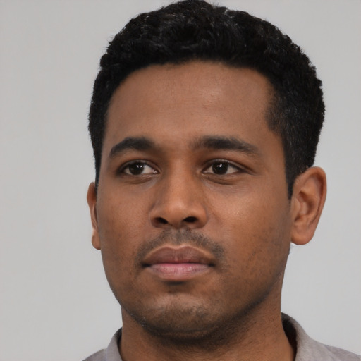 Neutral black young-adult male with short  black hair and brown eyes