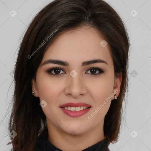 Joyful white young-adult female with long  brown hair and brown eyes