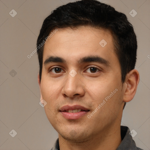 Joyful white young-adult male with short  black hair and brown eyes