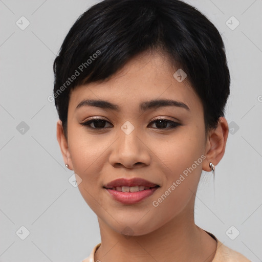 Joyful asian young-adult female with short  black hair and brown eyes